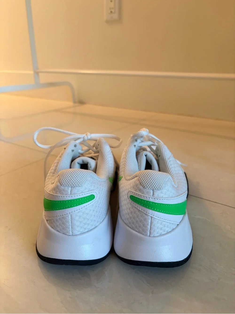 Nike White Sneakers with Bright Green Swoosh